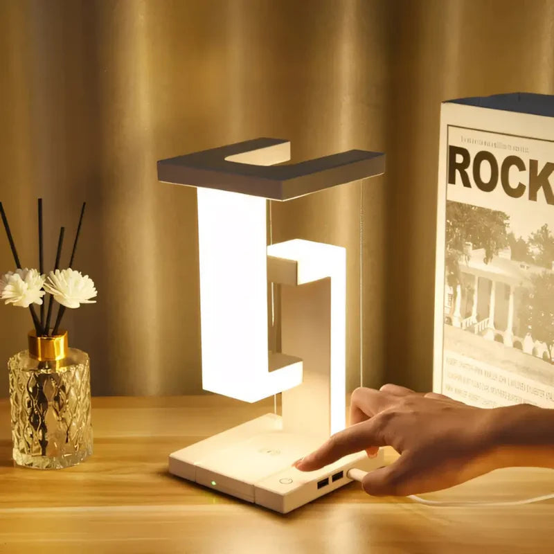 Suspended table lamp with wireless charging