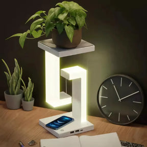 Suspended table lamp with wireless charging